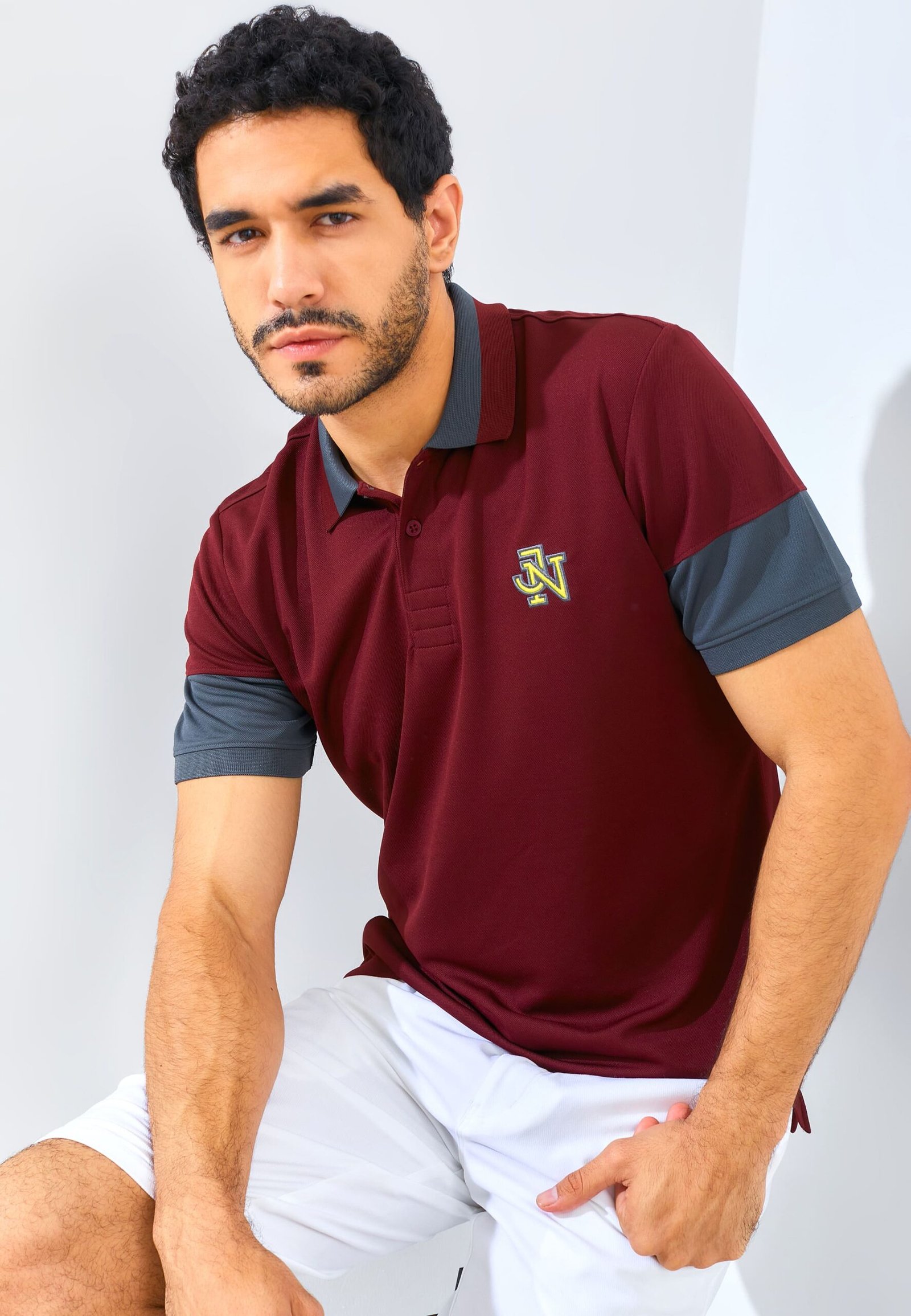 Jack Nicklaus Clark Polo Shirt Pria Slim Fit Burgundy