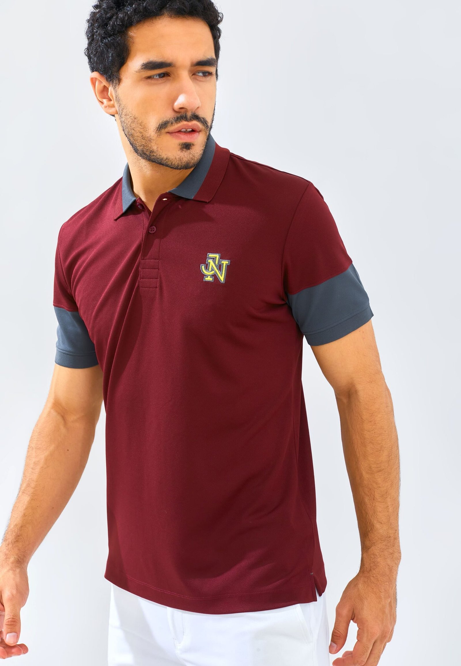 Jack Nicklaus Clark Polo Shirt Pria Slim Fit Burgundy - Image 5
