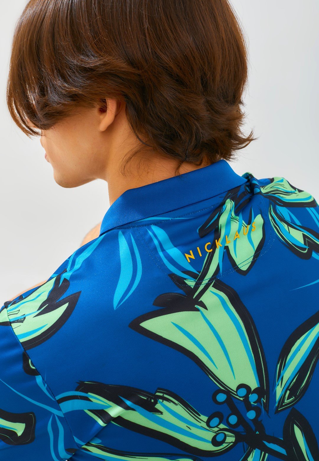 Jack Nicklaus Hibiscus Polo Shirt Pria Slim Fit Ocean Blue - Image 3