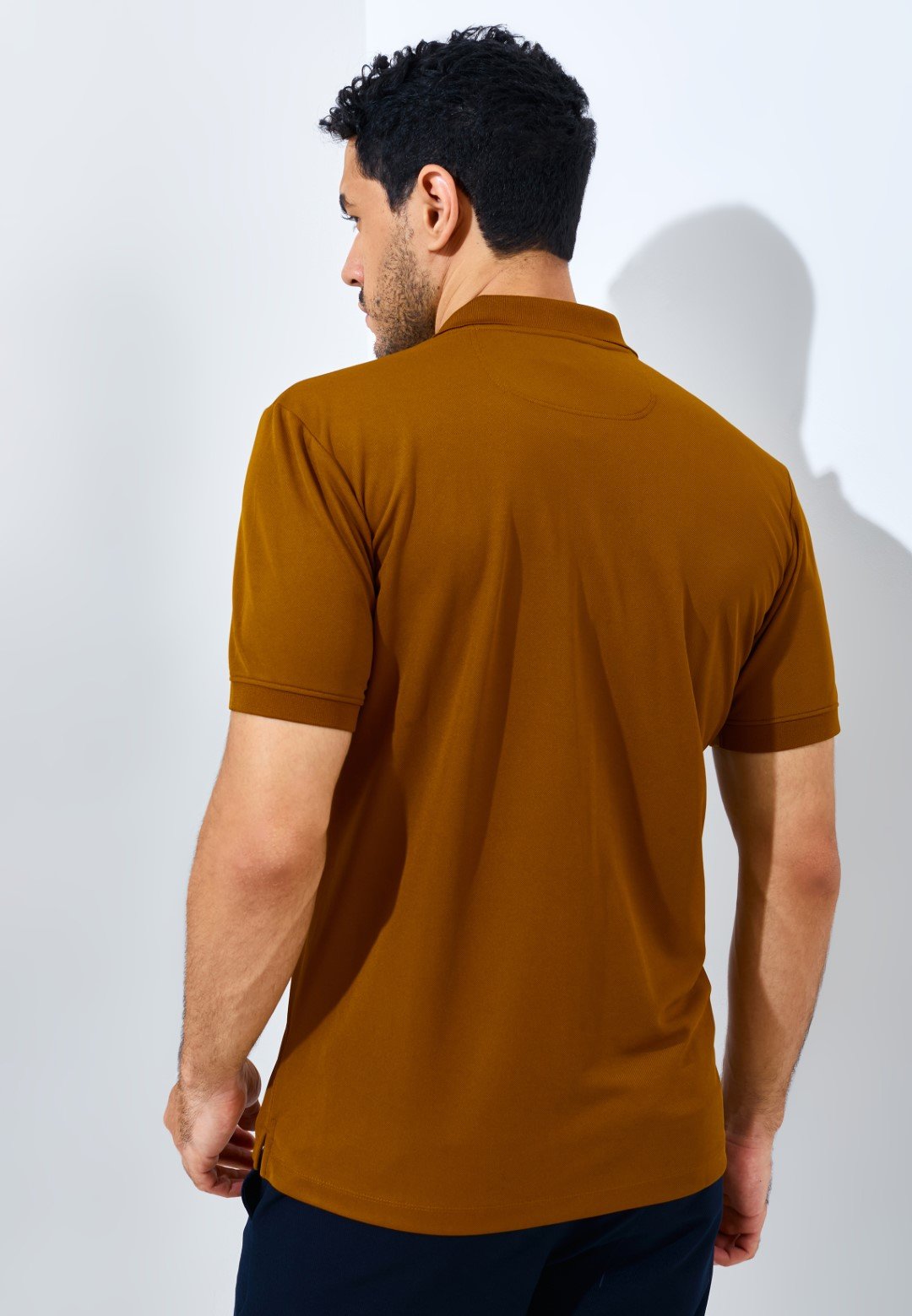 Jack Nicklaus Ion Polo Shirt Pria Slim Fit Tapenade Brown - Image 4