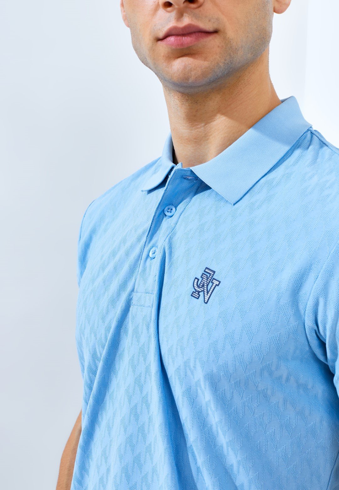 Jack Nicklaus Odyssey Polo Shirt Pria Slim Fit Light Blue - Image 5